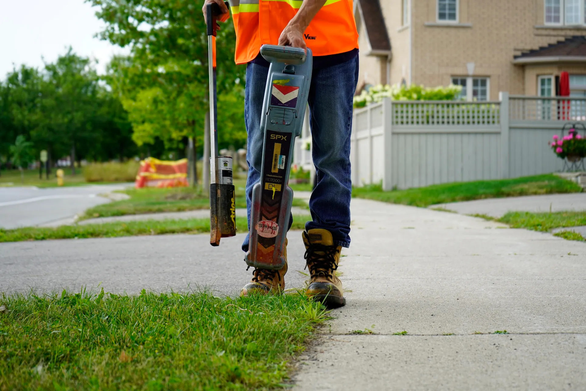 Utility locator marking underground infrastructure